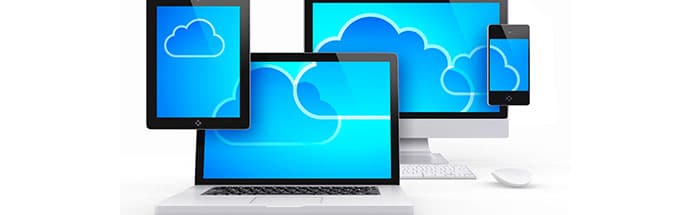 Computer, tablet, and phone screens connected by clouds