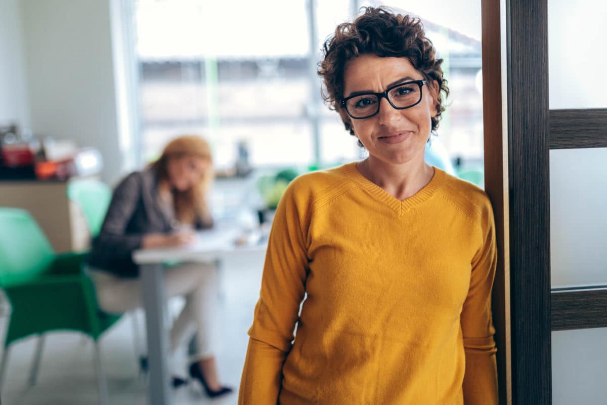 Portrait business women in the office Managed IT Header