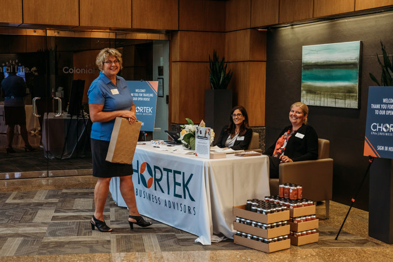 Chortek Summer 2019 Open House - Lori, Ann, and Angela manning the check-in table