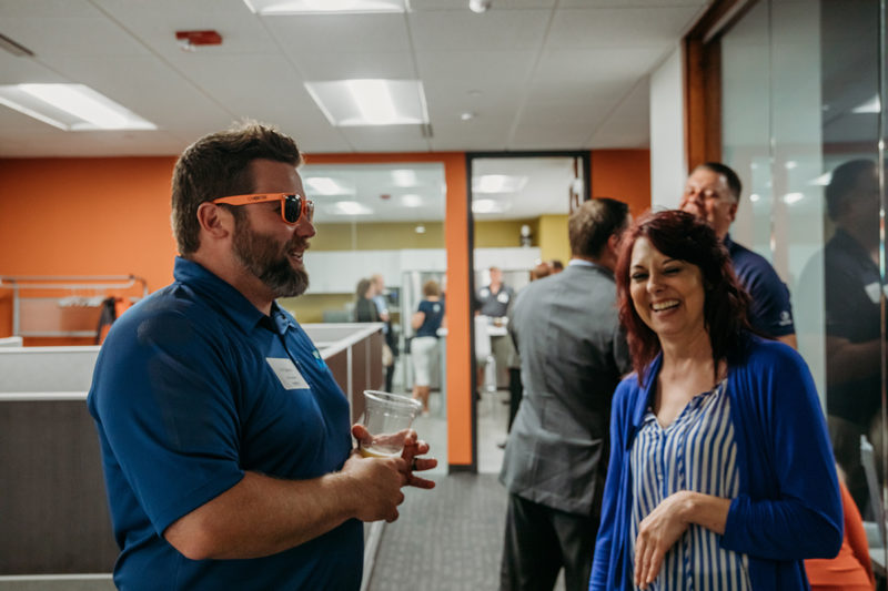 Chortek Summer 2019 Open House - Terri Webber laughing with one of our attendees