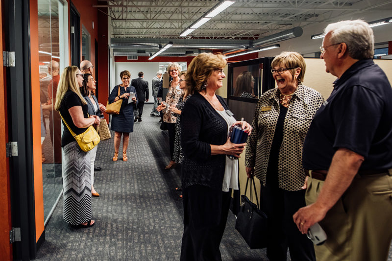 Chortek Summer 2019 Open House - Amy, Julie, and others in the hallway