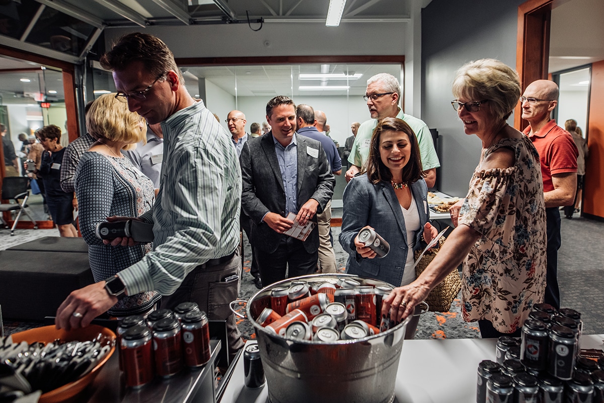 Chortek Summer 2019 Open House - guests enjoying the detail on our branded beers