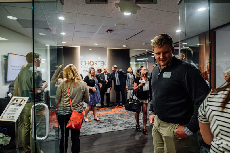Chortek Summer 2019 Open House - employees and guests gathering in the front entrance