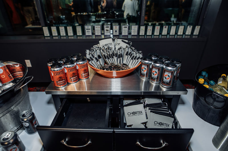 Chortek Summer 2019 Open House - Chortek branded beer and other merch in our conference room