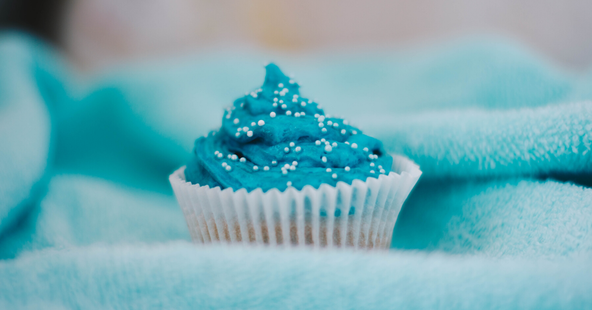 QuickBooks Online Advanced is blue in our rainbow, represented by this blue frosted cupcake