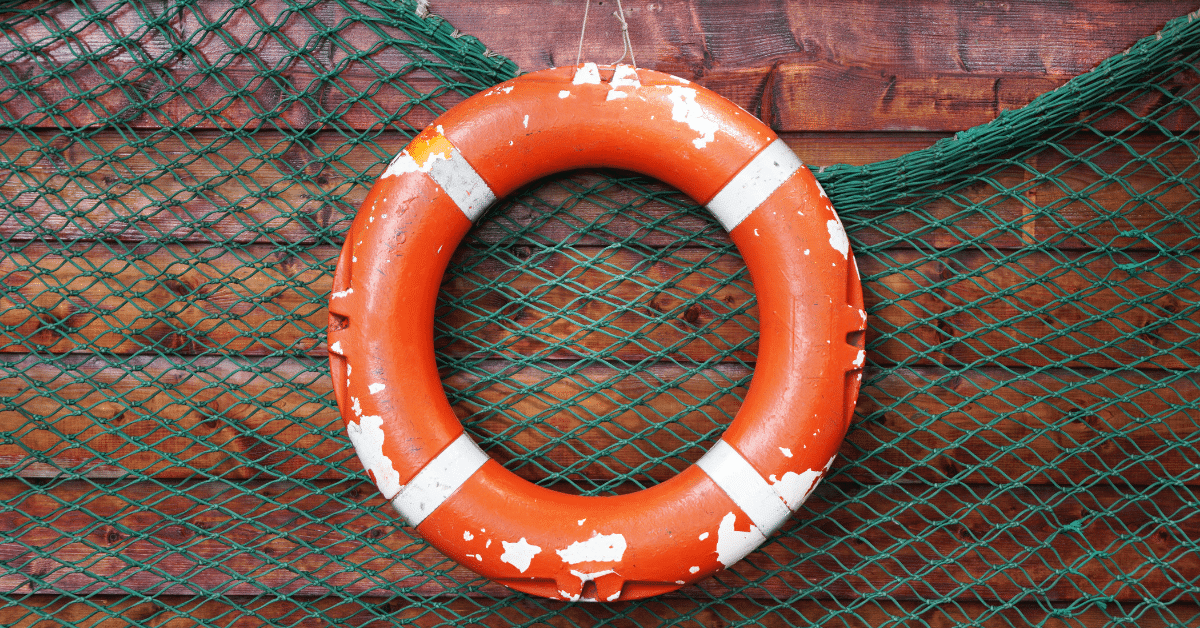 Employee Retention Credit - Image of a lifesaver hanging from the side of a boat