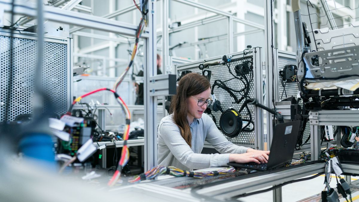 woman using Chortek's financial management services in a lab